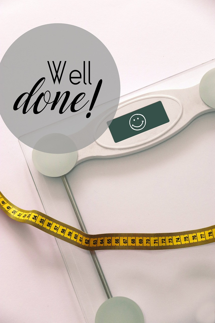 Bathroom scale and phrase "well done"
