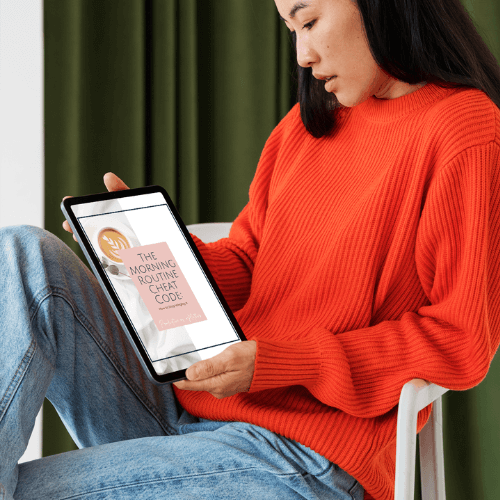 Woman viewing The Morning Magic Guide on a Tablet