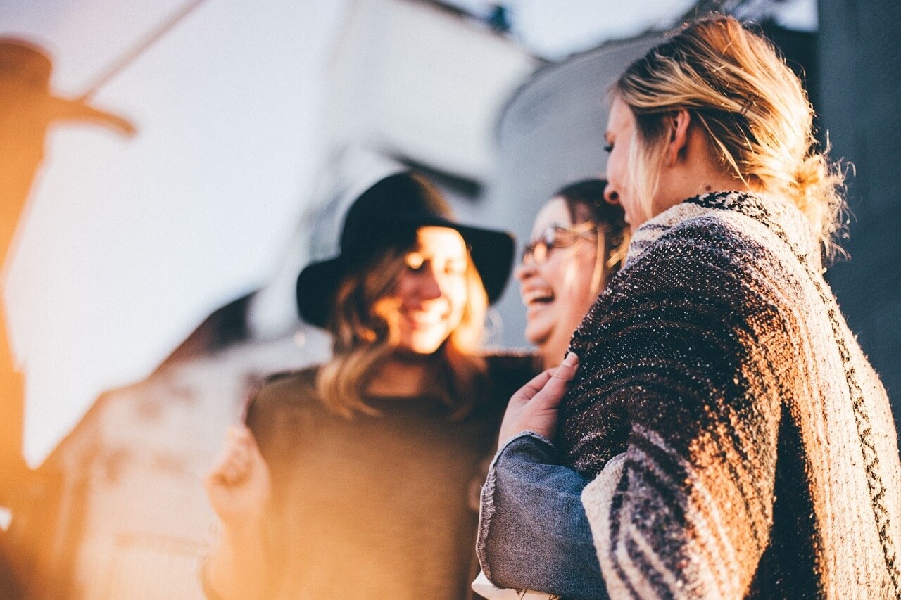 Group of middle-aged women laughing together