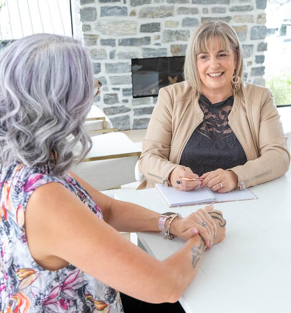  Hypnotherapist supporting a client in a calm, grounded burnout recovery session