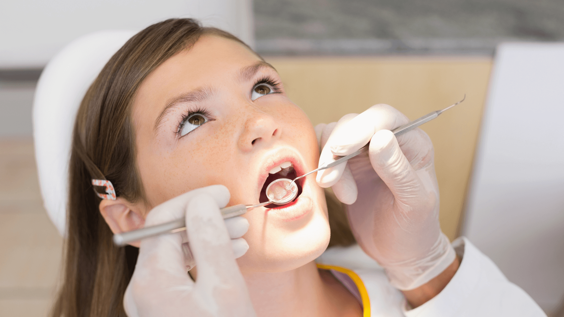  Teen calmly attending a dental appointment, showing confidence after overcoming dental anxiety.