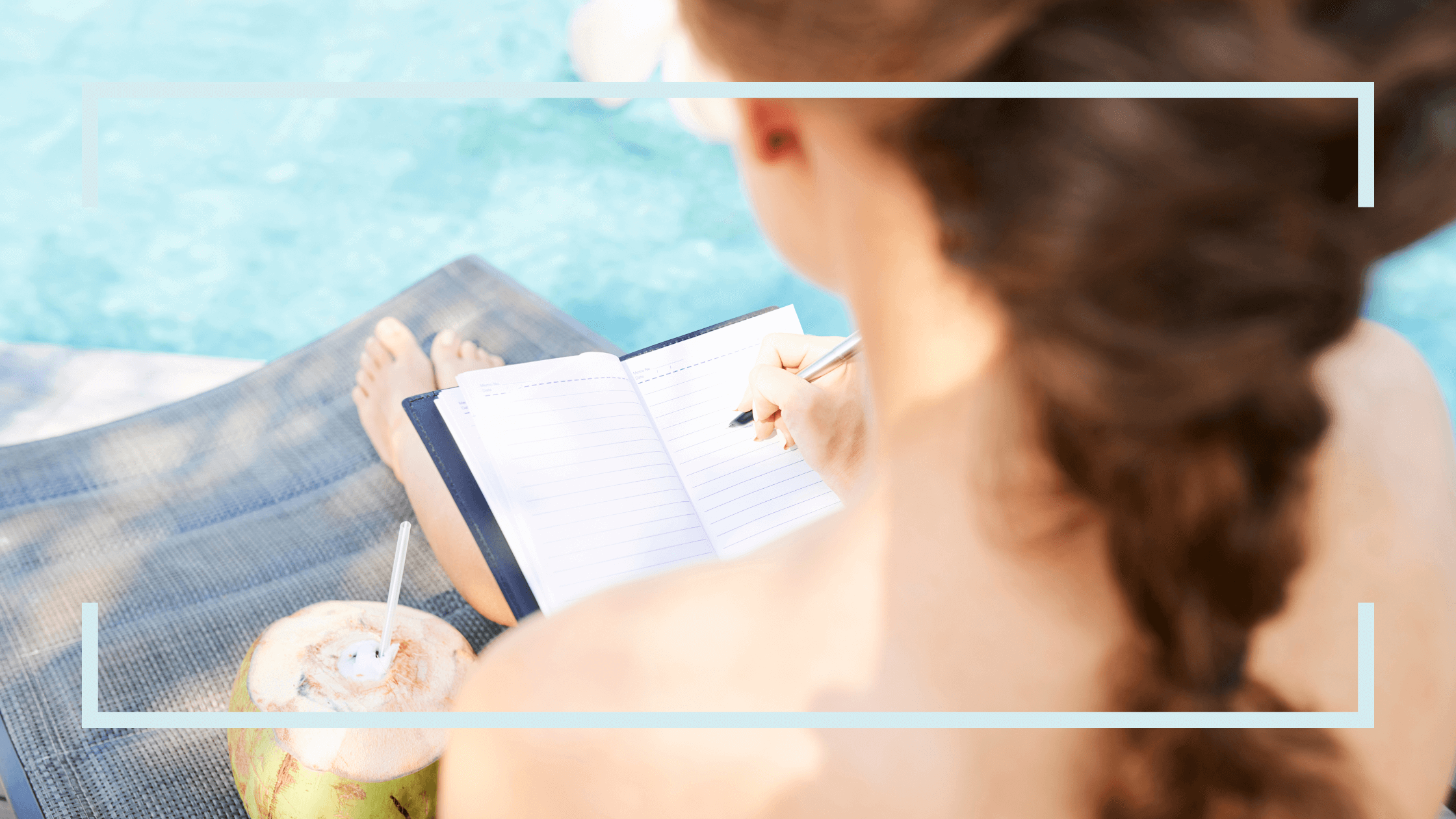  Glow Your Mind Studio journaling tools for self-growth. A woman sitting by a pool with her back to the camera, writing in an open journal while sipping from a fresh coconut, creating a serene and relaxed atmosphere.