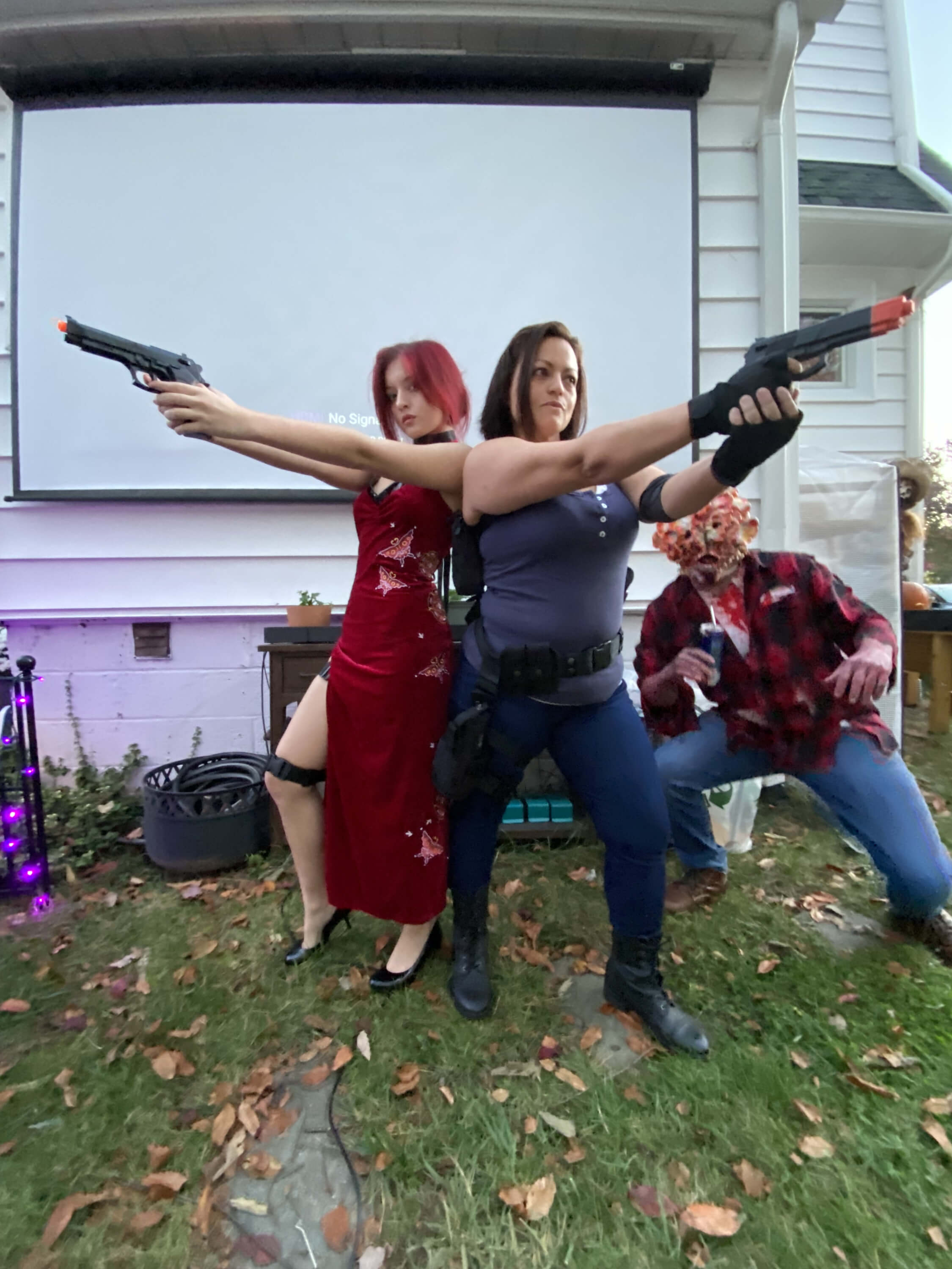  Portrait of Désirée Santiago in cosplay as character Claire Redfield from Resident Evil, with other cosplayers
