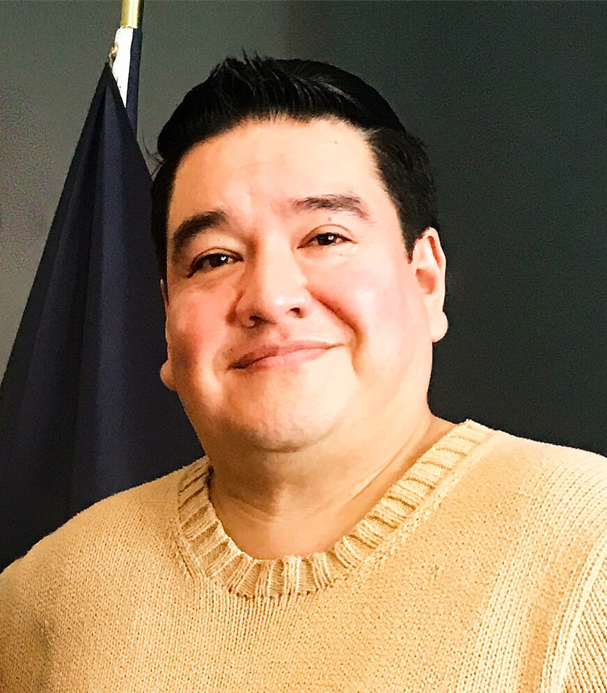  Image of smiling dark haired man
