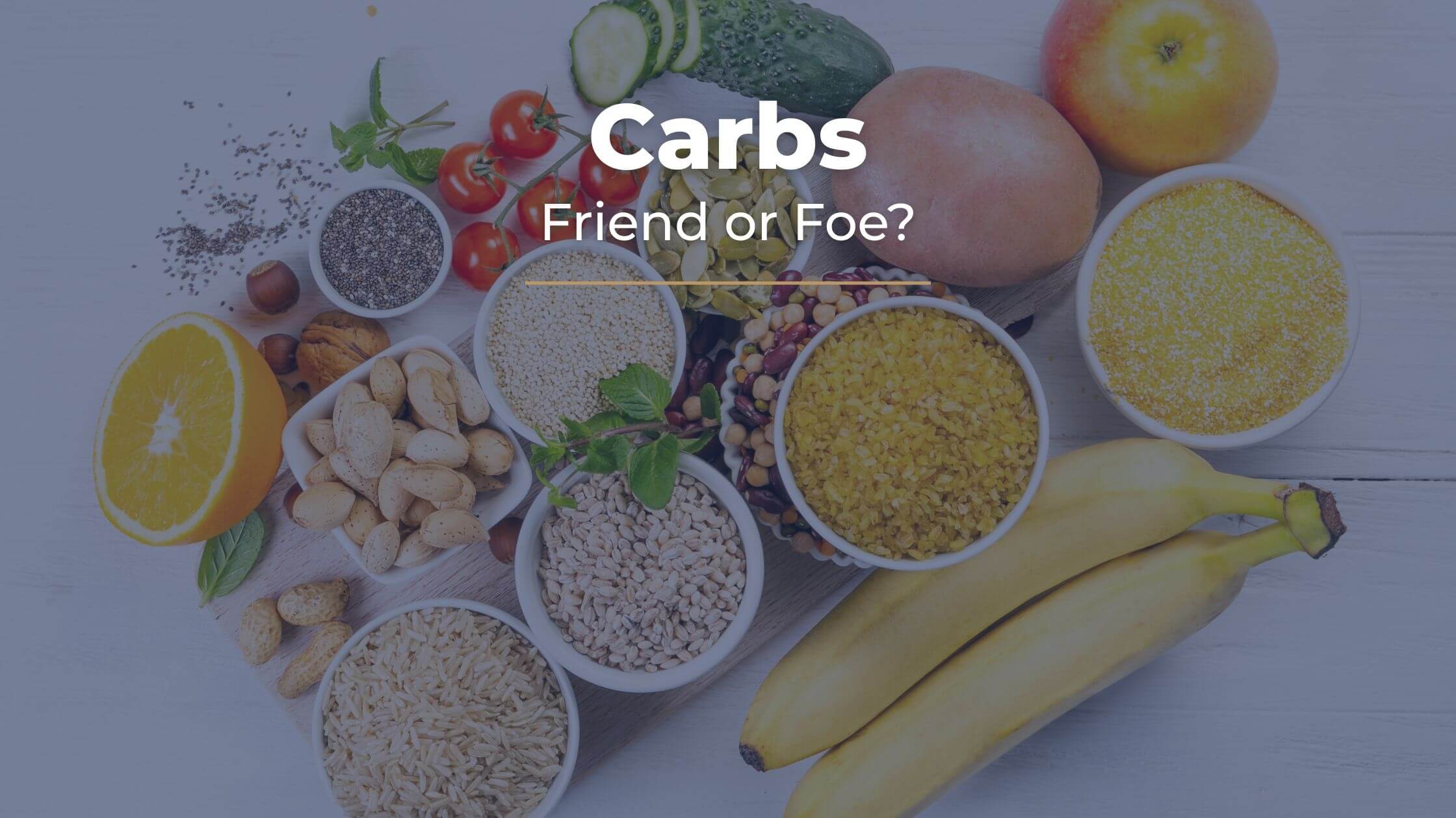 A variety of carbohydrate-rich foods including fruit, grains, legumes, and seeds arranged on a board, with the text “Carbs: Friend or Foe?” displayed above.