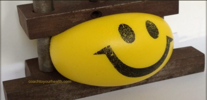 Smiley face in vice