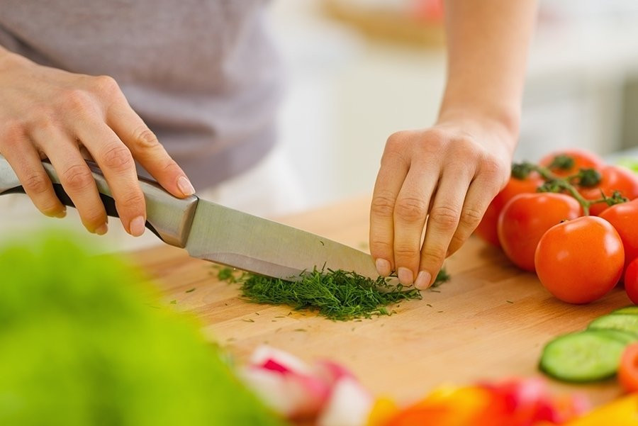 Chopping herbs and veggies